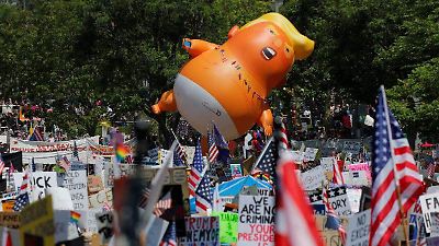 Protestas masivas en EE.UU. contra la política de Trump en medio de desfile militar y asesinato político