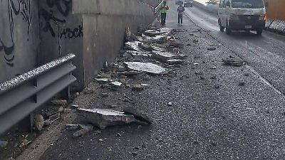 Usuarios de la autopista México-Puebla exigen mantenimiento tras desplome de muro de contención y riesgo en la vía