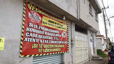 Vecinos de San Mateo Tlalchichilpan utilizan lonas antifraude para reducir la delincuencia